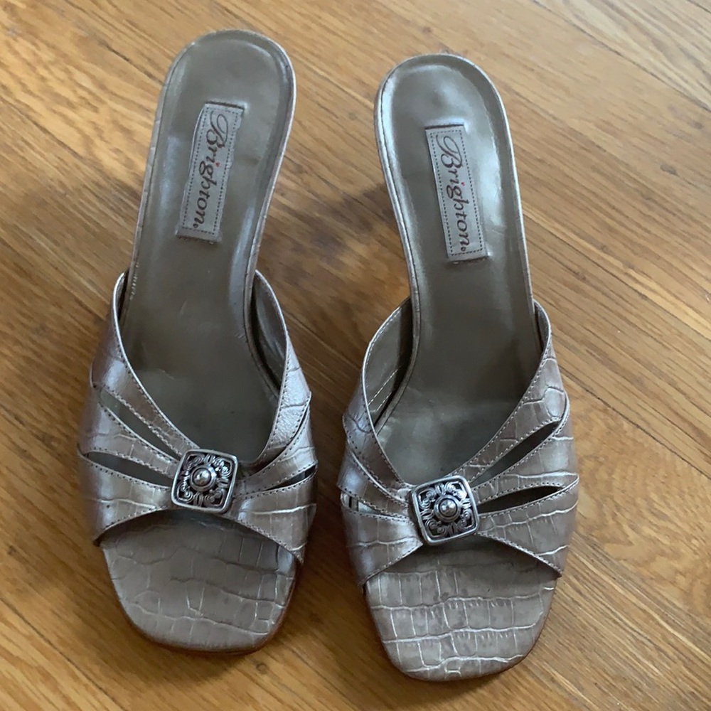 Cute slide style sandal dresses up any outfit.